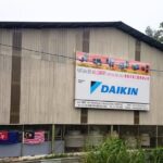 Warehouse building with signboard and flags outside, ACL Comfort Air-Cond Sdn. Bhd, Johor Bahru