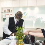 Staff gathered at reception desk inside clinic, ARC Beauty & Wellness Centre, Petaling Jaya