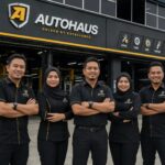 Staff team posed outside service workshop entrance, Autohaus KL, Seri Kembangan