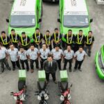 Staff posed with delivery vans and motorbikes, Bateriku.com, Shah Alam