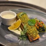 Herb-crusted fish with sauce and vegetables on plate, Big Onion Food Caterer, Kuala Lumpur