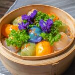 Colorful steamed dumplings in bamboo basket with garnish, Canning Dim Sum, Kinta