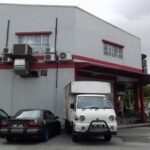 Building exterior with parked truck and car, Citarasa Uniq Sdn Bhd, Petaling