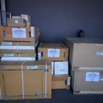 Stacked boxed aircon units in storage area, Cooling Solution Sdn.Bhd, Petaling
