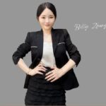Woman posing in black blazer with name label, Do Wig PG分行 - 专业男女假发定制, George Town