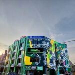Colorful mural building with hotel signboard on street, Hotel Salaam Suites, Kota Bharu