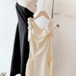 Two dresses displayed on hanger and mannequin, J'simple Online Boutique, George Town