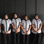 Staff lined up in matching uniforms with logo, Legacy Cleaning Sdn Bhd, Petaling Jaya