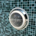 Pool light fixture installed on tiled wall, NEZOD Pools Products, Batu