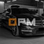 A car parked inside a workshop garage, Optimal Premium Motors, Subang Jaya