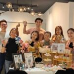 Team posing with soaps and beauty products on display, Parfumeurco, Subang Jaya