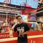 Man holding drink and ice cream at food kiosk counter, Restoran Hello Bite, Kota Setar