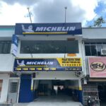 Tyre shop storefront with Michelin signage and shutter, Swee Hing Tyres, Johor Bahru